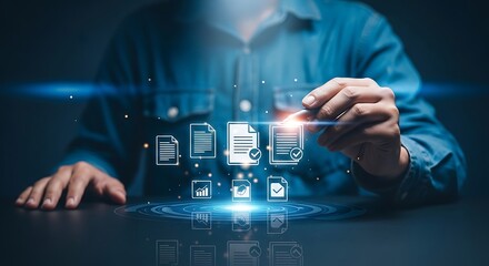Fototapeta premium Businessman interacting with digital document icons on a futuristic interface