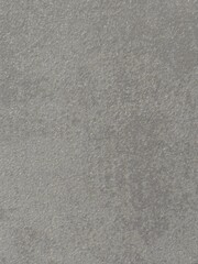 Fototapeta premium Gray concrete surface texture with rough granular finish close up