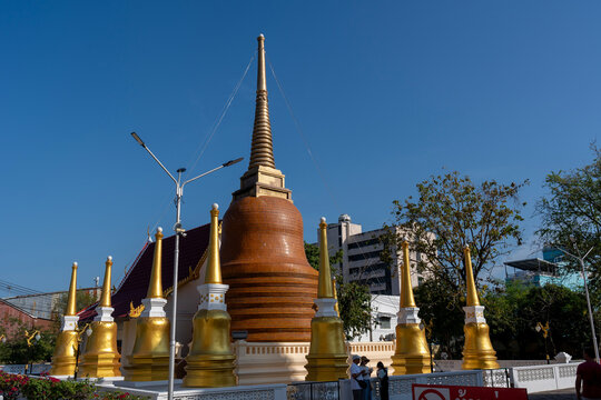 Large chedi at Wat Mongkol Nimit in Phuket Town, Thailand. Type of tower which content holy relics. Place where Buddhist come to meditate