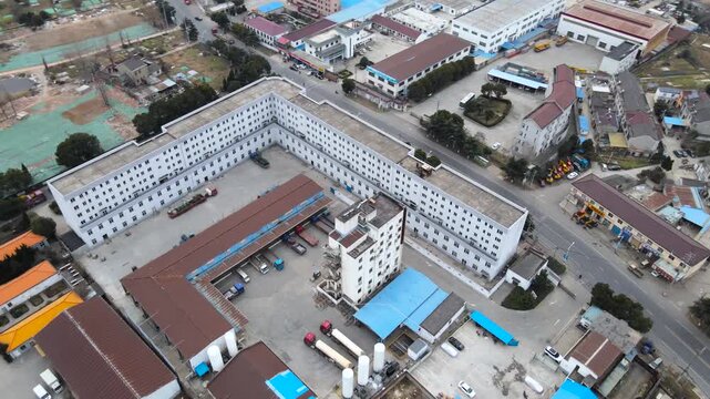Aerial View of Industrial Complex with Warehouses and Office Buildings