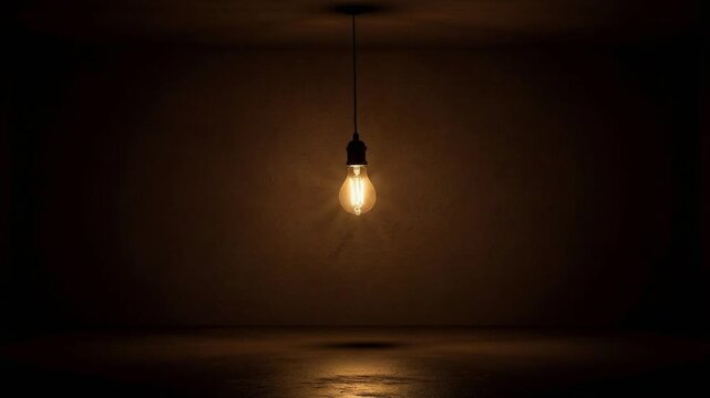 Glowing light bulb gently swaying in dark empty room with warm flickering shadows creating cozy atmosphere