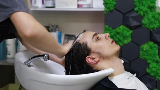 Hair washing procedure in beauty salon