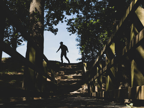 Person taking steps along the path 