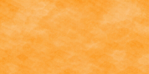 Obraz premium A vintage grunge parchment background features an abstract textured orange and brown pattern with aged, stained paper elements for an antique artistic design