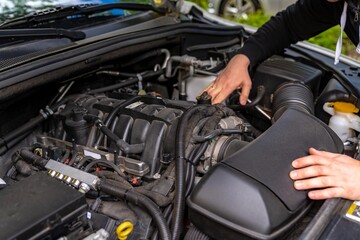 Fototapeta premium Careful tuning and finetuning of vehicle engine systems done professionally. Expert technicians precisely calibrate engine components to enhance vehicle performance and efficiency