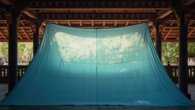 sky-blue tarp beneath the roof