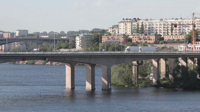 Stockholm, Sweden Traffic on the elevated Essingeleden E4 highway on a sunny day. 