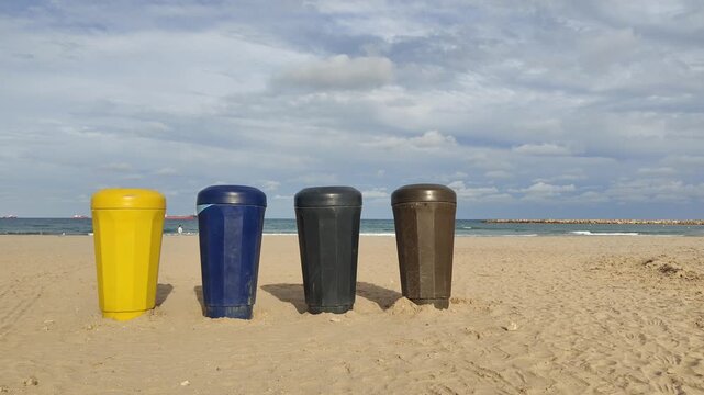 Tall recycling bins for the beach, specifically designed and manufactured to withstand the harsh conditions of sand and salt spray on the beach.
