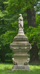 Fototapeta premium Dessau, Germany 05.24.2026Antique stone monument with female statue