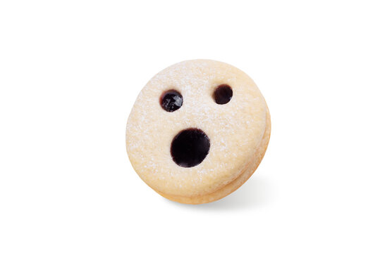 Linzer cookies in the form of scary monster for Halloween holidays on a white isolated background
