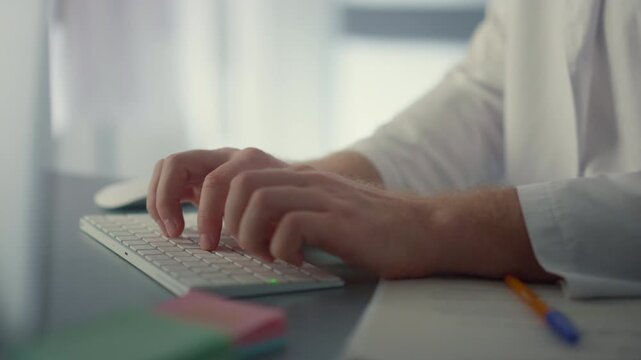 Medical Professional at Work &ndash; Hands on Keyboard in Clinic