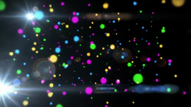 Dynamic, abstract animation of hyper-luminous, multi-colored particles (electric blue, magenta, gold, emerald green) drifting in an inky black cosmic void. Mesmerizing light show concept