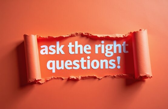 White text on orange paper background states ask the right questions. Ripped paper reveals hidden message. Concept for inquiry and curiosity.