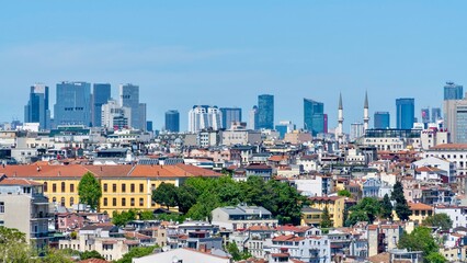 Naklejka premium Istanbul, Turkey - May 19, 2026: Panoramic view of Istanbul, Turkey, showing the city skyline, buildings, urban neighborhoods, rooftops, and scenic cityscape.