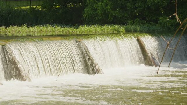 Water flowing over small Texas river dam