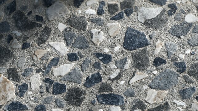 Close-up of exposed aggregate concrete texture background with multi-colored stones