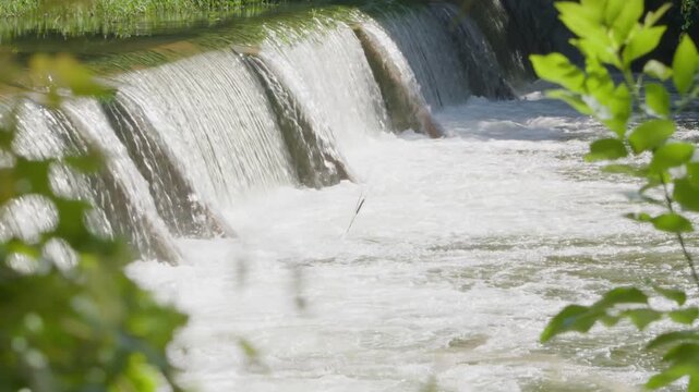 Water flowing over small Texas river dam
