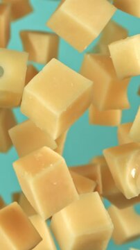 Pieces of maasdam cheese fly upwards on a blue background. Filmed on a high-speed camera at 1000 fps. High quality FullHD footage