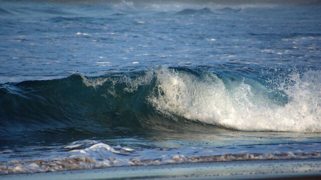 Waves breaking on the beach in Zipolite, Mexico