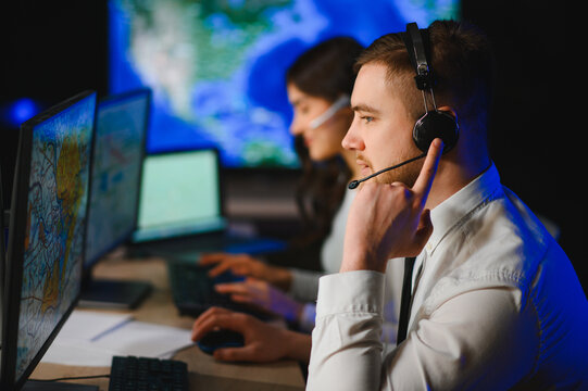 Dispatch team members managing communication in control center
