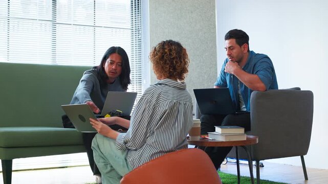 Tech Startup Team Working with Laptops on Robotics and Coding Project Group of Software Developers and Engineers Collaborating in Modern Office
