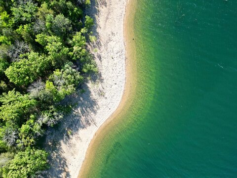 aerial view pf emerald water and shoreline