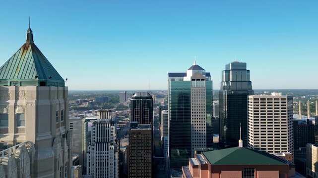 Aerial view of skyscrapers against a blue sky