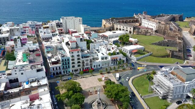 Drone view of the entrance to old San Juan  showing the colonial Spanish colorful homes and the castle San Cristobal.