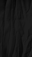 Obraz premium Dark crumpled texture, black mobile wallpaper with a rugged style.