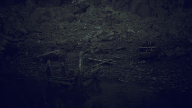 Foggy tidal flat strewn with wreckage, muddy shoreline, scattered wooden beams and metal fragments, still water reflecting dim sky, desolate atmosphere ideal