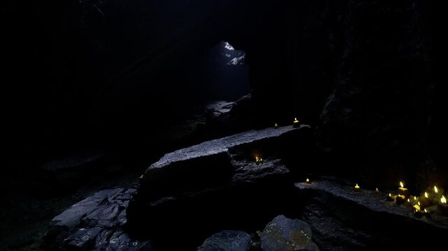 Ancient underground temple stone steps bathed in single light beam, weathered altar and scattered votive candles, echoing acoustics and mineral textures create
