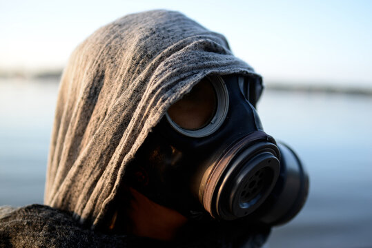 person wearing gas mask