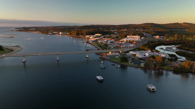 Panoramic aerial drone view of Batemans Bay on the NSW South Coast, Australia, looking out to the coastline and Tasman Sea on a sunny early morning in May 2026   
