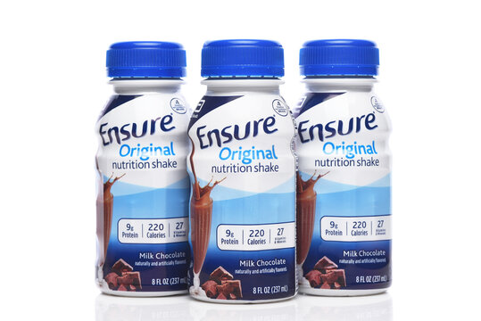 IRVINE, CALIFORNIA - 21 MAY 2026: Three bottles of Ensure Original Nutrition Shake Milk Choclate Flavor.