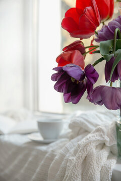 White cup on the window.