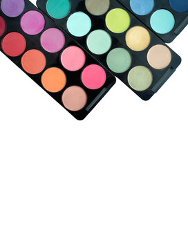 Set of eyeshadows palette, closeup isolated on white background.