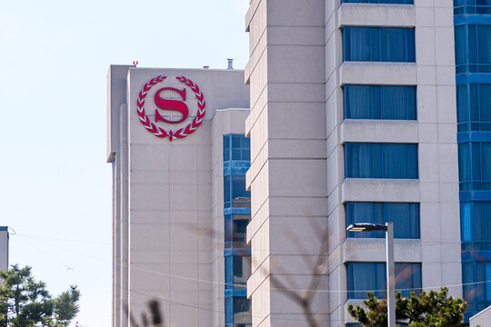 Sheraton hotel logo and building exterior in Toronto.