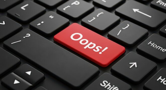 Red Oops Key on a Black Computer Keyboard