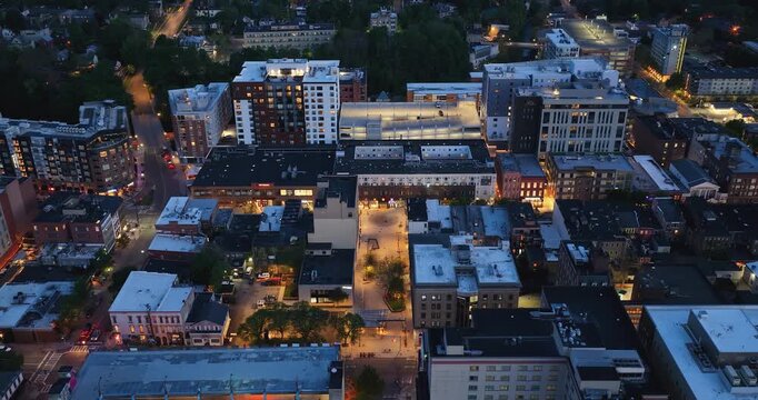 Ithaca, NY, USA - 05-18-2026  Night aerial hyperlapse video of downtown, commons, on a spring evening.