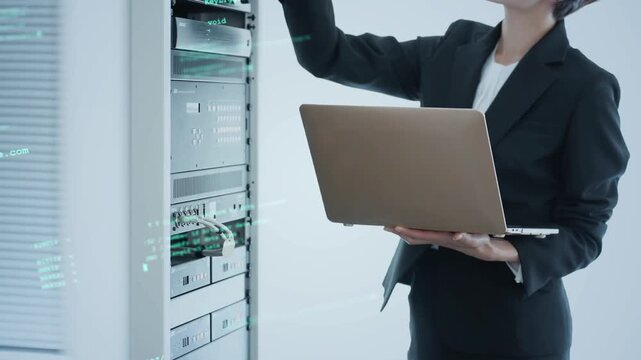 サーバを点検する女性エンジニアとデジタルテクノロジーのコンセプト