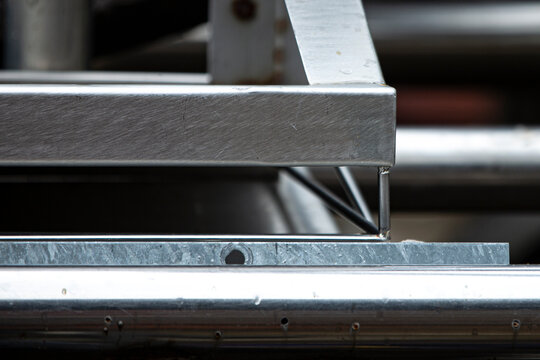 Stainless steel parts, closeup of photo. Industrial background