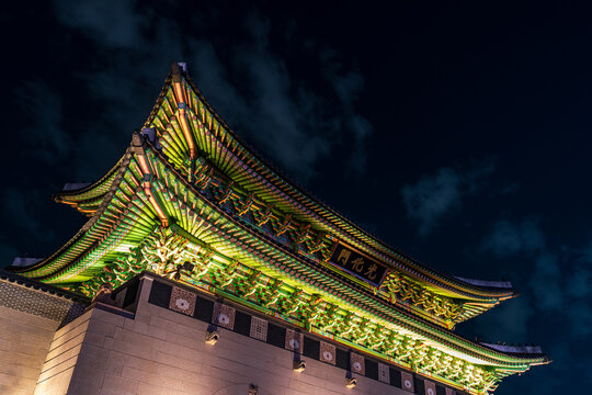 Seoul, South Korea - May. 14, 2026 : Magnificent low-angle night view of Gwanghwamun Gate, the main gate of Gyeongbokgung Palace, illuminated in Seoul, South Korea