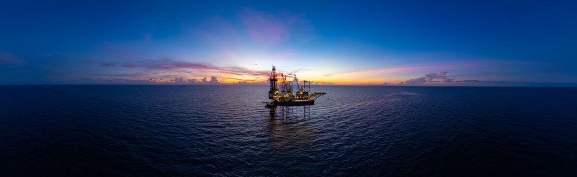 Aerial panoramic view of offshore jack up rig and offshore platform