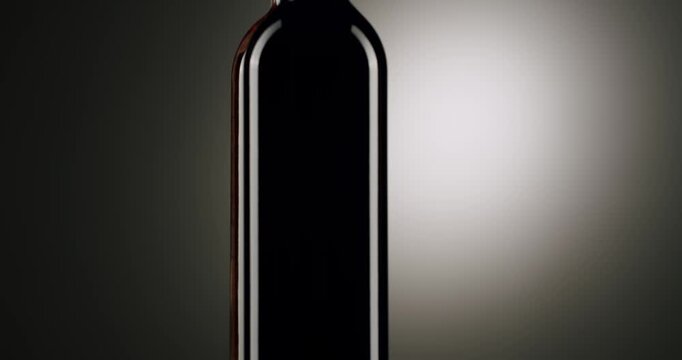 Assorted wine bottles, including red, white, and rose, slowly appearing one by one in a row against a dark, dramatic background, creating an elegant and sophisticated display of varieties