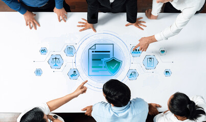 Obraz na płótnie Canvas A group of professionals collaborates over a pivotal document, highlighting aspects of security and compliance within a modern business environment. Trope