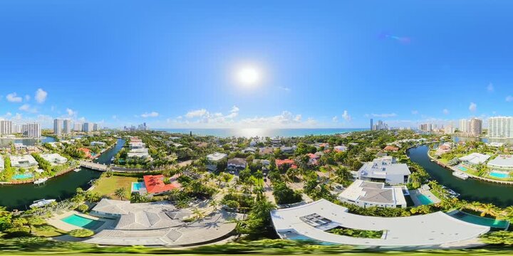 360 VR flight over luxury homes in Golden Beaech Florida 8k stock video