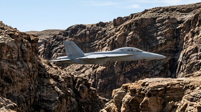 Fighter Jet Flying Through Rocky Canyon