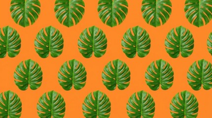 Naklejka premium Vibrant Tropical Monstera Leaf Pattern on a Bright Orange Background.