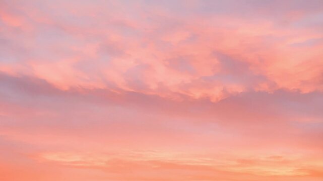 Peaceful pink and orange streaked sky during gentle calm sunset evening