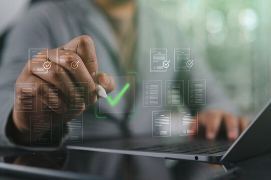 Business checklist management and performance tracking concept with businessman using laptop and tablet, representing online document approval, digital forms, task monitoring, and survey completion.